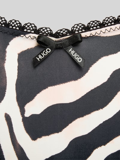 Produktfoto, String mit Spitzenbesatz von HUGO in Two-Tone-Optik mit Logo-Schleife Applikation, Stoff weich, Muster schwarz-weiß.