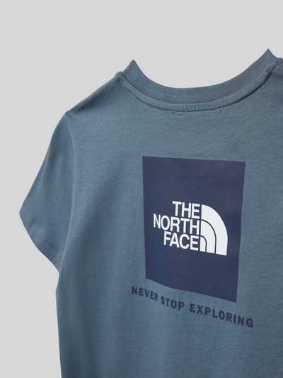 Produktfoto, Regular Fit T-Shirt mit Logo-Print von The North Face in Blau mit Statement-Print auf dem Rücken, Rundhalsausschnitt, glatte Textur