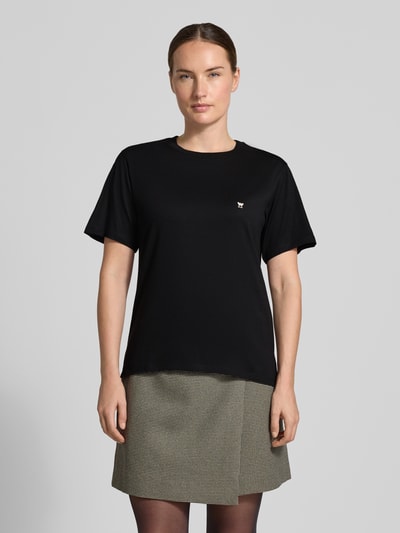 Vrouwenmodel draagt Regular Fit t-shirt van zuivere katoen model 'VENACO' van Weekend Max Mara in zwart, eenvoudige rechte vormen, Ganzkörperaanzicht van voren, Dames t-shirt van Weekend Max Mara.