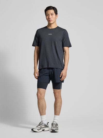 Salomon Tights mit Logo und Reißverschlusstasche Black 1