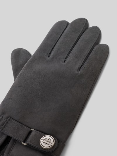 Produktfoto, Handschuhe aus Schafsleder mit Toch-Funktion Modell 'Stanton' von Roeckl, Used-Look, halbstepp, reines Wollfutter, Lederriemen, Oberfläche matt schwarz, feine Fingerstruktur.