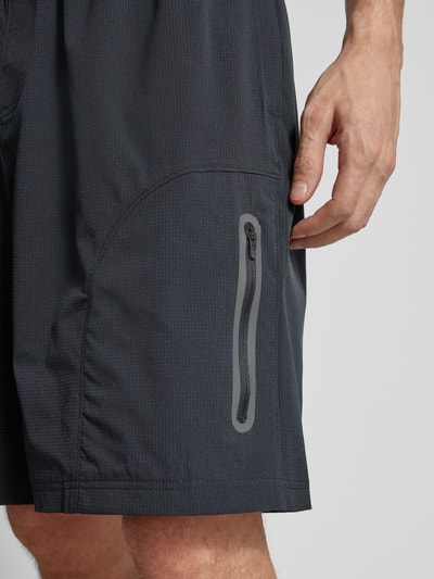 Under Armour Relaxed fit korte broek met ritszakken, model 'Unstoppable' Zwart - 3