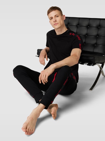 HUGO Sweatpants aus Baumwolle mit Galonstreifen Modell 'Sporty' Black 1