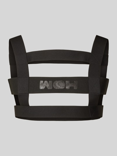 Produktfoto, schwarzer Harness mit Label-Detail und Cut Outs, Modell 'Night Universe' von WOH, Material-Mix mit Stretch-Anteil, breite Träger, körpernaher Schnitt.