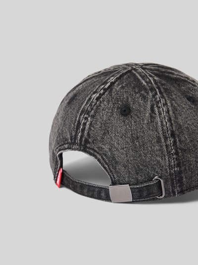 Produktfoto, Basecap in Denim-Optik von Diesel aus reiner Baumwolle im Destroyed-Look mit verstellbarem Riegel und Label-Patch auf der Rückseite.