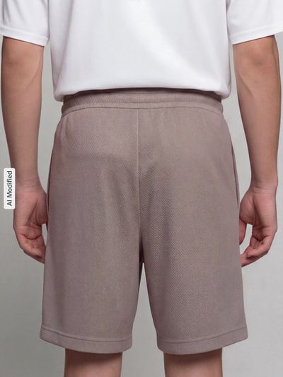 PUMA Performance Relaxed Fit Sweatshorts aus Baumwoll-Mix 'ESS ELEVATED' Schlamm 3