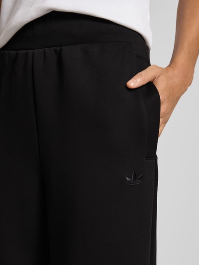 adidas Originals Spodnie dresowe z elastycznym ściągaczem Czarny 3