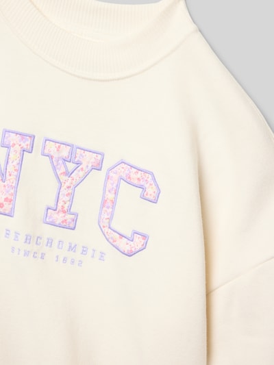 Productfoto, Sweatshirt mit Label-Stitching van Abercrombie&Fitch, katoenmix, los model, ronde hals, duimlussen, ribboorden, crèmekleur