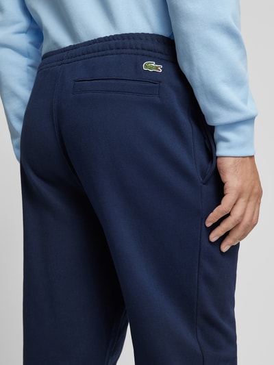 Lacoste Tapered fit sweatpants met labelprint, model 'HERITAGE' Donkerblauw - 3