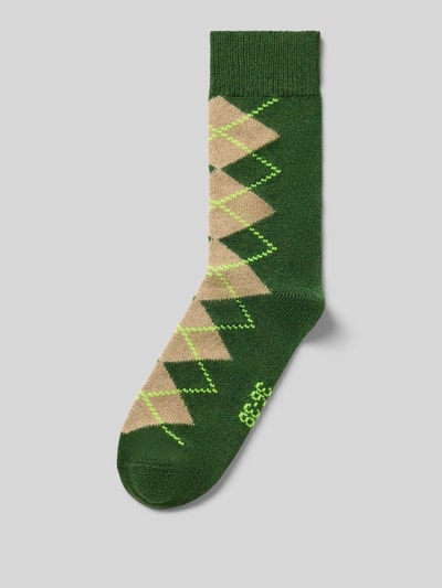 Produktfoto, Socken mit Kaschmir-Anteil im Karo-Design von UNIO HAMBURG, grüne Farbfläche mit beigen und gelben Rauten, Baumwoll-Mix, gerippte Bündchen