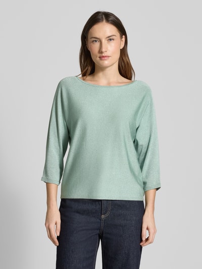 Frauenmodel trägt Relaxed Fit Pullover aus Viskose-Mix in Strick-Optik von comma, mintgrün, U-Boot-Ausschnitt, Ganzkörperansicht von vorne.