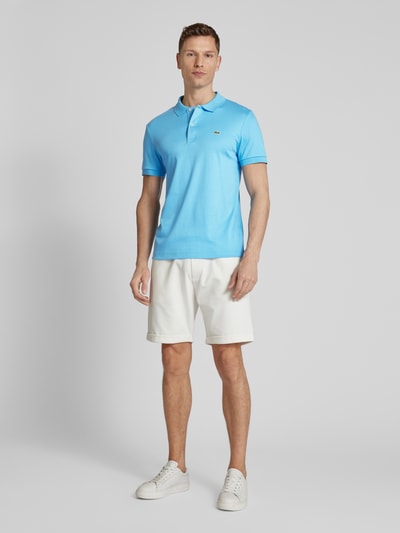 Lacoste Koszulka polo o kroju regular fit w jednolitym kolorze Musztardowy 1