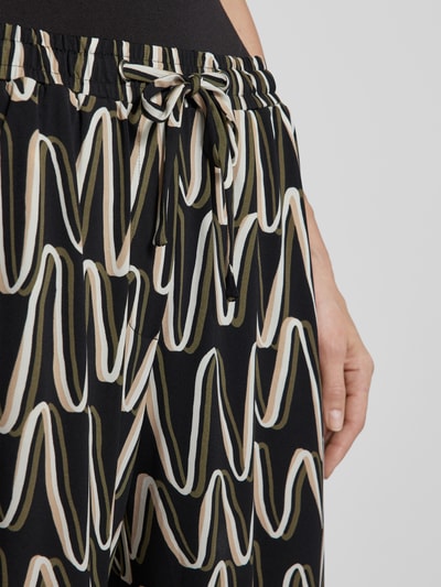 Betty Barclay Spodnie materiałowe o rozkloszowanym kroju ze wzorem na całej powierzchni Czarny 3