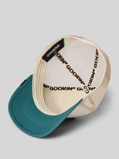 Produktfoto, Trucker Cap mit Stitching Modell 'Bulletproof' von GOORIN BROS., Herren Trucker Cap, Material-Mix mit Baumwoll-Anteil, verstärkter Schirm, Größenverstellbar, Innenansicht, grün-beiger Farbmix, strukturierte Schirmtextur.
