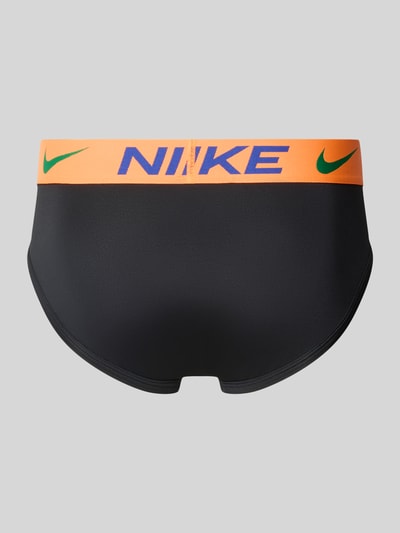 Produktfoto, Slip mit Label-Bund im 3er-Pack von Nike für Herren in Schwarz mit orangefarbenem Bund, glatte Struktur, Rückansicht.
