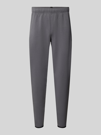 Under Armour Regular Fit Trainingshose mit Baumwoll-Anteil Modell 'Unstoppable' Anthrazit 1