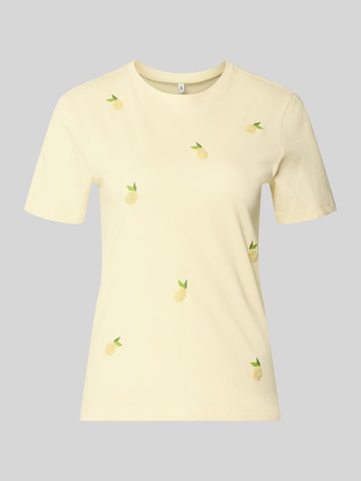 Produktfoto, Regular Fit T-Shirt aus reiner Baumwolle Modell 'KITA' von Only, unifarben in zartem Gelb mit Motiv-Stitching, Jersey-Textur.