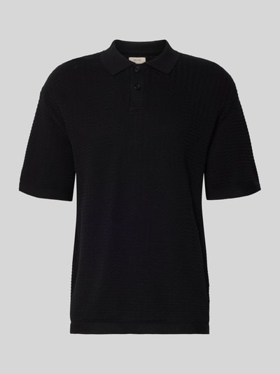 Produktfoto, schwarzes Relaxed-Fit Poloshirt Modell 'FERDINAND' von Redefined Rebel aus Reine Baumwolle mit Strickstruktur und Knopfleiste.