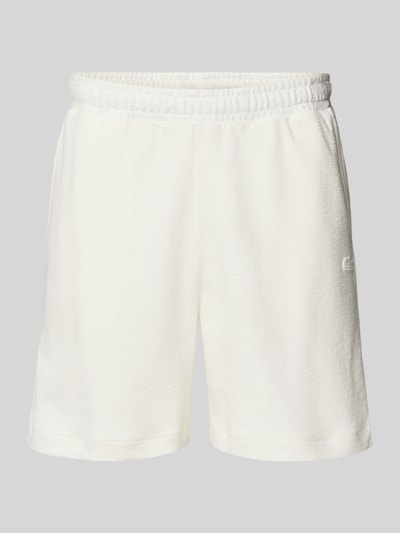 Produktfoto, Regular Fit Sweatshorts aus reiner Baumwolle von Lacoste in Optik: Unifarben, Materialverarbeitung: Crêpe, Bundabschluss: elastisch, Logo-Stitching, Verschluss: Tunnelzug
