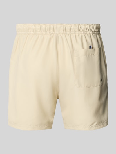 Produktfoto, Badeshorts mit Label-Applikation Modell 'DOGFISH' von BOSS in unifarbenem Beige, elastischer Bund, Gesäßtasche, leichte Textur