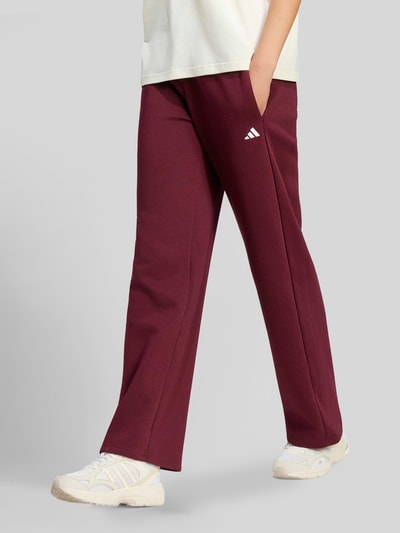 adidas Sportswear Spodnie dresowe o kroju regular fit z mieszanki bawełny model 'W SL FC PT' Bordowy 4
