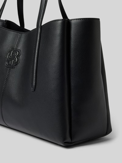 Produktfoto, Shopper in leerlook model 'Anett New L Tote' van BOSS, look: effen zwart, karabijnsluiting, hoofdvak, binnenvak met rits, logo-applicatie, draagband.