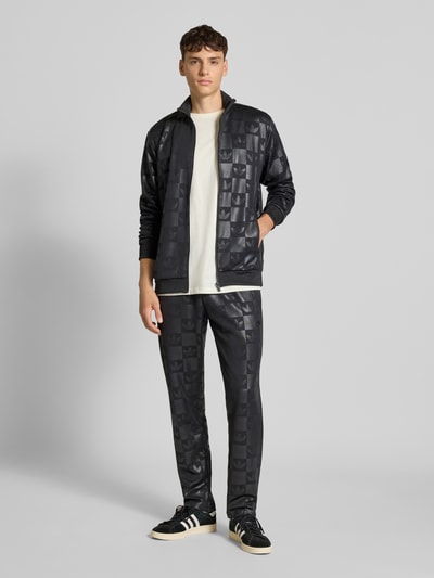 adidas Originals Regular fit sweatpants met all-over logoprint, model 'Reg' Zwart - 1