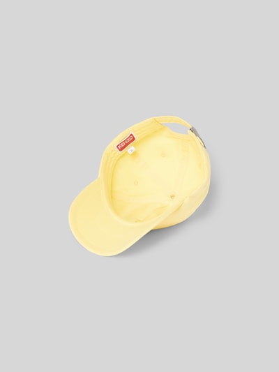 Produktfoto, Basecap aus reiner Baumwolle von Kenzo in Gelb mit verstärktem Schirm, Label-Patch, verstellbarem Riegel, Belüftungslöcher.