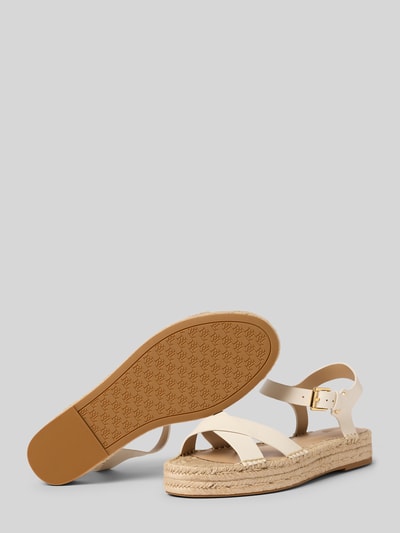 Produktfoto, Sandalen aus reinem Leder Modell 'EMERYN ESPDR' von Lauren Ralph Lauren in Beige, unifarben, runde Schuhspitze, Espadrill-Absatz, strukturierte Sohle, Dornschließe, Applikation mit Label-Prägung, glatte Ledertextur.