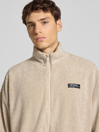 REVIEW Kurtka polarowa ze stójką i detalem z logo Beżowy 3