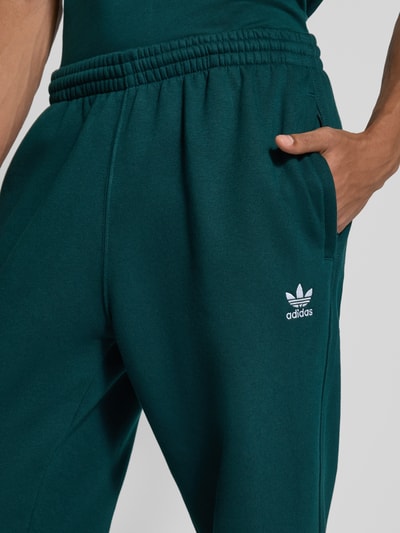 adidas Originals Spodnie dresowe z elastycznym pasem i wyhaftowanym logo Ciemnozielony 3