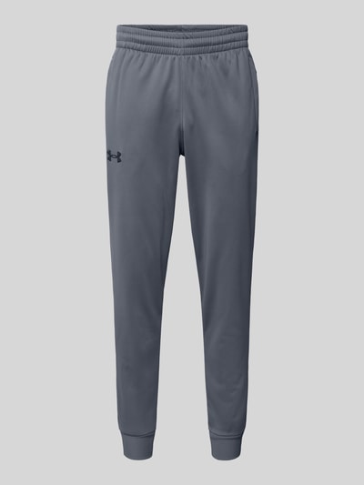 Produktfoto, Sweatpants mit elastischem Bund von Under Armour w kolorze szarym, luźny krój, kieszenie boczne, długość nogawki 78 cm
