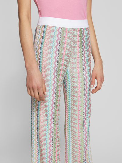 Marc Cain Flared stoffen broek met all-over motief Neon groen - 3