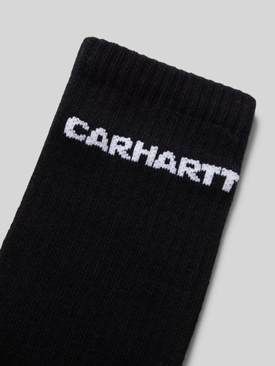 Produktfoto, Socken mit Label-Detail von Carhartt Work In Progress in Schwarz aus Baumwoll-Mix mit Stretch-Anteil, sichtbares Label-Detail