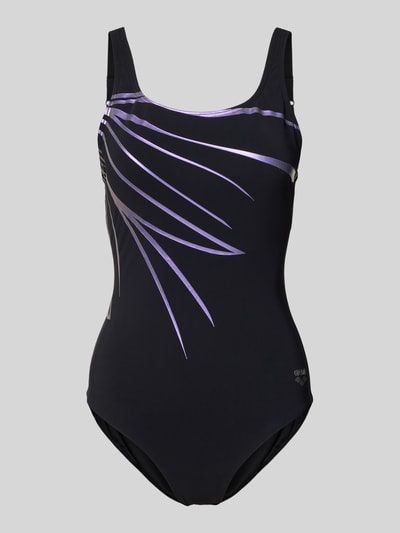Frauenmodel trägt Badeanzug mit Logo Modell 'LILI' von Arena aus schwarzem Material-Mix mit Stretch-Anteil, körpernahe Passform, Logo-Print, Ganzkörperansicht von vorne.