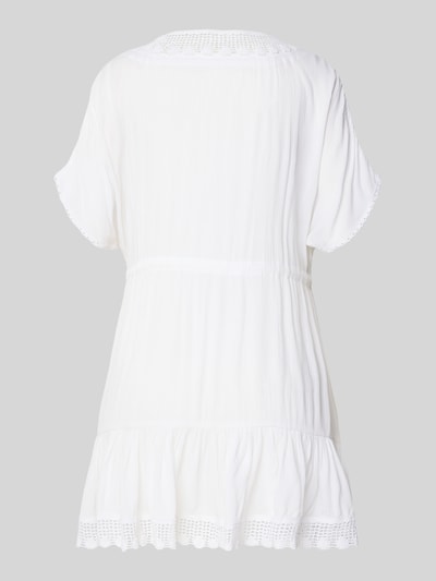 Frauenmodel trägt Minikleid aus Reiner Viskose mit Schnürung Modell 'AVELLE SEATIME' von Banana Moon, A-Linie, Ganzkörperansicht Rückansicht.