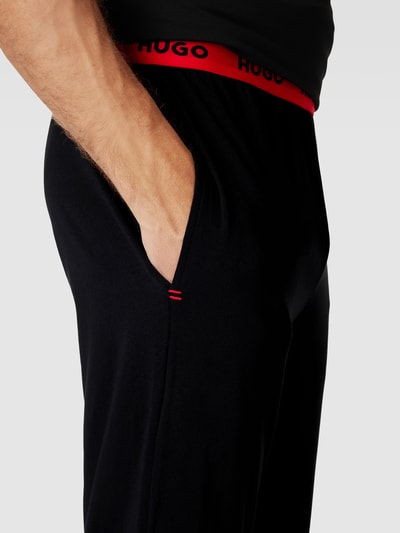 HUGO Sweatpants met elastische band met logo, model 'Linked' Zwart - 3