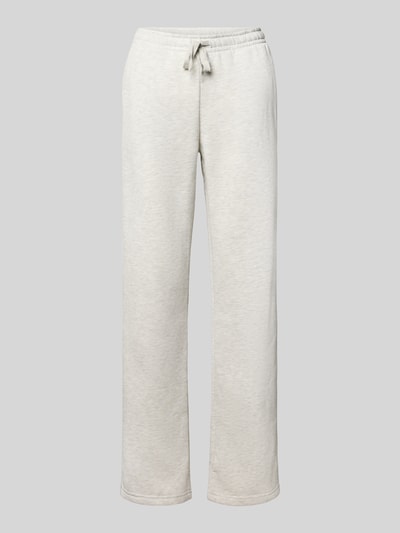 Produktfoto, jasnoszare spodnie dresowe krój wide fit z mieszanki bawełny, elastyczny pas z tunelem, Model 'Iconic' od Gina Tricot, długość wewnętrzna nogawki w rozmiarze S: 80 cm