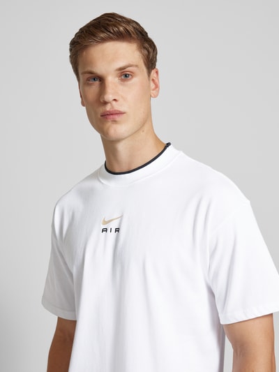 Nike T-shirt z nadrukiem z logo Złamany biały 3