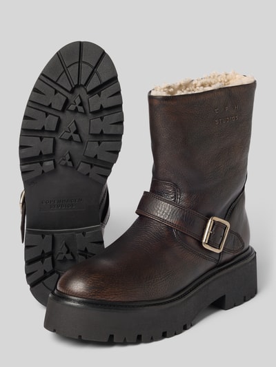 Produktfoto, Boots aus echtem Leder mit verstellbarer Schnalle von Copenhagen, dunkles Braun, strukturierte Sohle, Label-Detail, beige Innenfutter