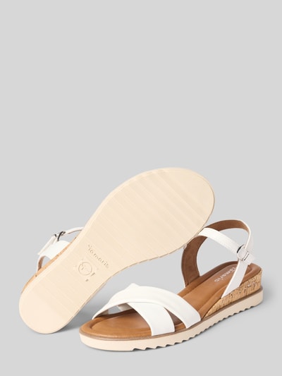 Produktfoto, Sandalen in Lederoptik mit Korkabsatz von Tamaris in Optik: Unifarben, Schuhspitze: Offen, Abgerundet, Absatzform: Keilabsatz, Label-Prägung, Verschluss: Dornschließe, Sohle: Korkabsatz, Profiliert.
