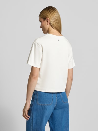 Vrouwenmodel draagt Regular Fit T-shirt uit puur katoen model 'SABATO' van Weekend Max Mara, look: effen, fijnrib, bloemenapplicatie, ronde hals, korte mouw, rugaanzicht.