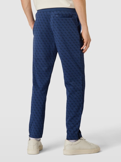 Guess Activewear Sweatpants mit Allover-Muster Modell 'KORBIN' Dunkelblau 5