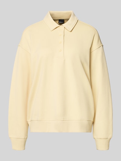 Produktfoto, Sweatshirt mit Polokragen und Knopfleiste von Gina Tricot in hellem Gelb, Damen Regular Fit, überschnittene Schultern, glatte Textur