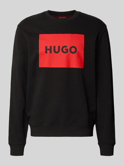 Produktfoto, Sweatshirt mit Label-Print Modell 'Duragol' von HUGO in Schwarz mit rotem Label-Print, Reine Baumwolle, Lockerer-Schnitt, Rundhalsausschnitt, Gerippte-Abschlüsse.