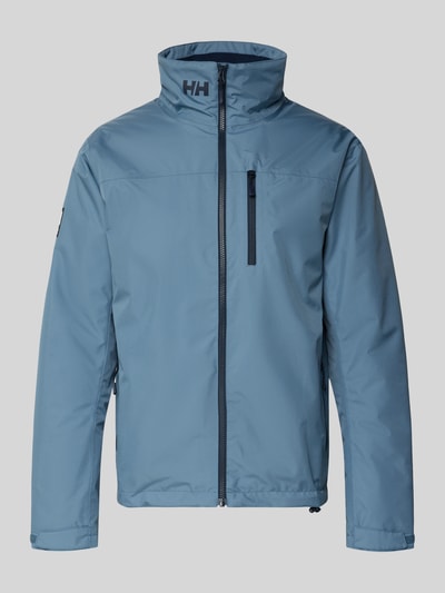 Produktfoto, Midlayer Jacke mit Stehkragen Modell 'CREW' von Helly Hansen, niebieska, prosty krój, logo, kieszenie na zamek, tekstura gładka