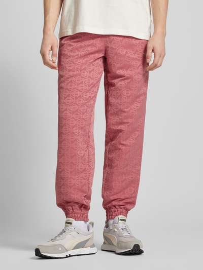 PUMA PERFORMANCE Sweatpants met all-over motief Rood - 4