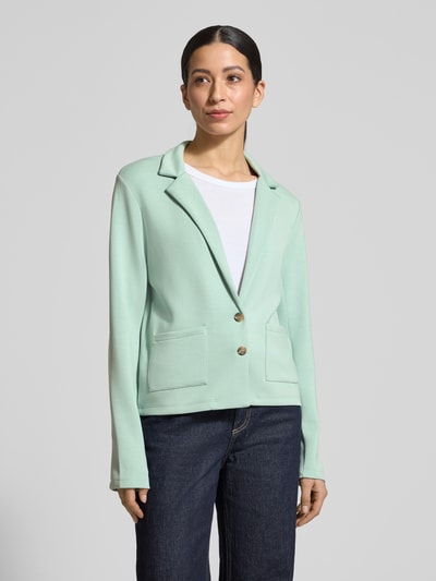 Vrouwenmodel draagt 'Sweatblazer met zakken en revers' van Christian Berg Woman in lichtgroen, regular fit, modalmix, vooraanzicht bovenlichaam.