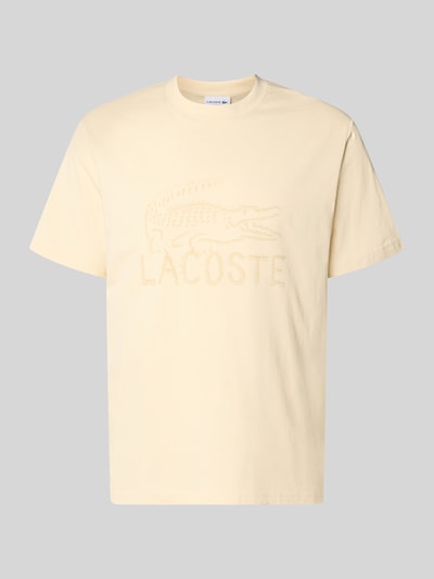 Produktfoto, Regular Fit T-Shirt aus reiner Baumwolle von Lacoste in Optik: Unifarben mit Logo-Print, Kurzarm, Rundhals, glatte Textur.