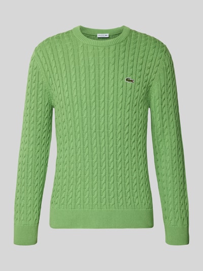 Produktfoto, Regular Fit Strickpullover aus Baumwoll-Mix von Lacoste in Grün, Optik: Unifarben, Zopfmuster, Logo-Patch, Kontrastnaht, Rundhals, Langarm, Ärmelabschluss und Rumpfabschluss gerippt, Materialverarbeitung: Strick, Material: Baumwoll-Mix